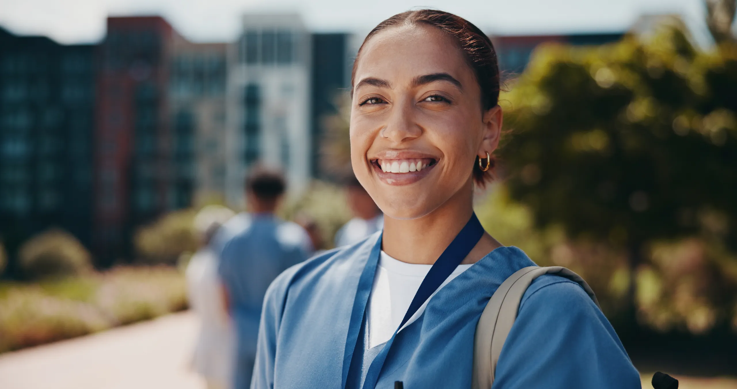 A health research trainee on a university campus